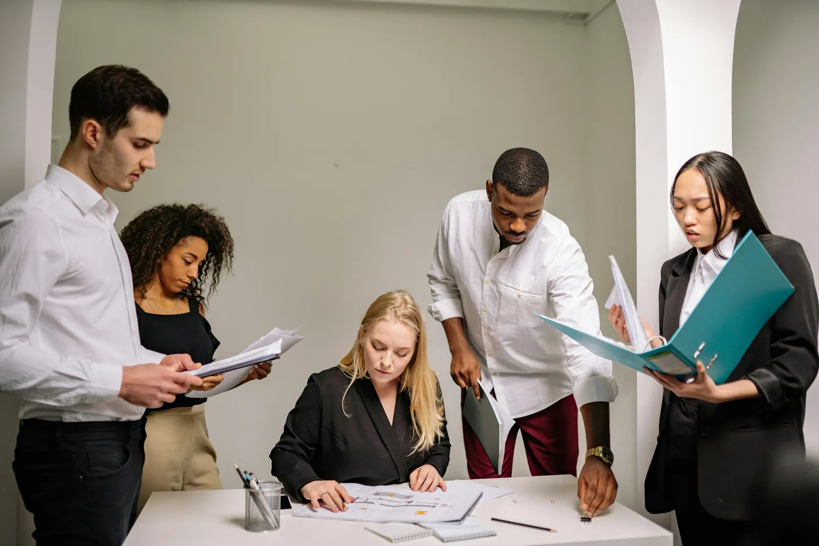Legal team reviewing documents together