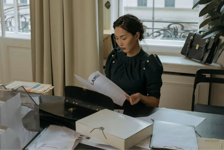 Legal professional reviewing documents