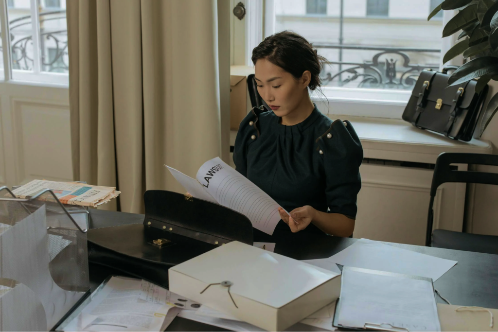 Legal professional reviewing documents