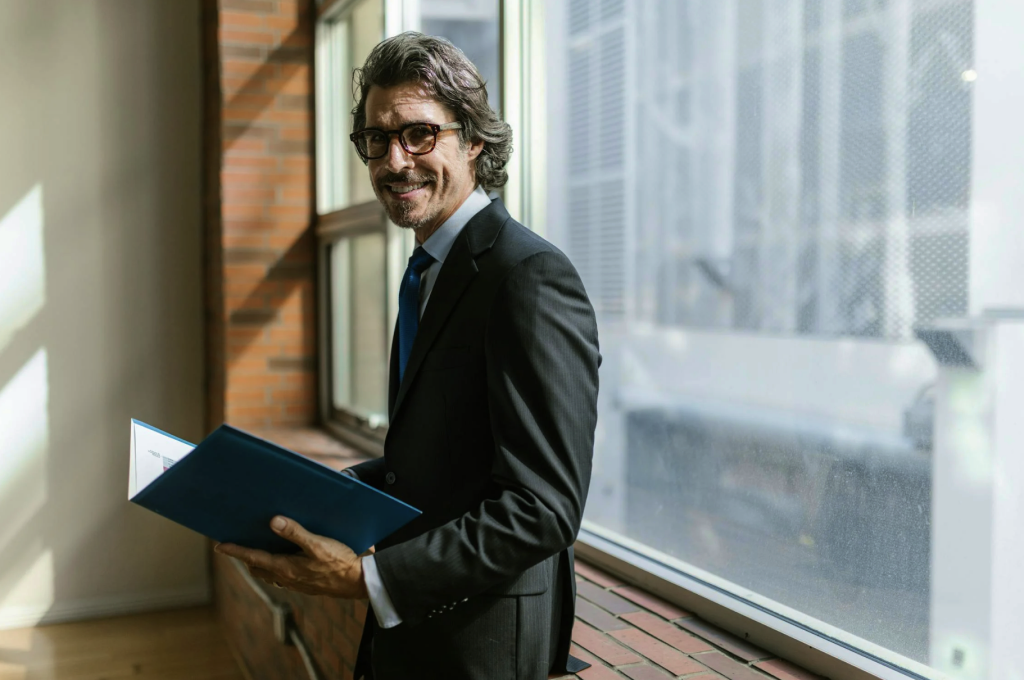 Legal professional reviewing documents at the office